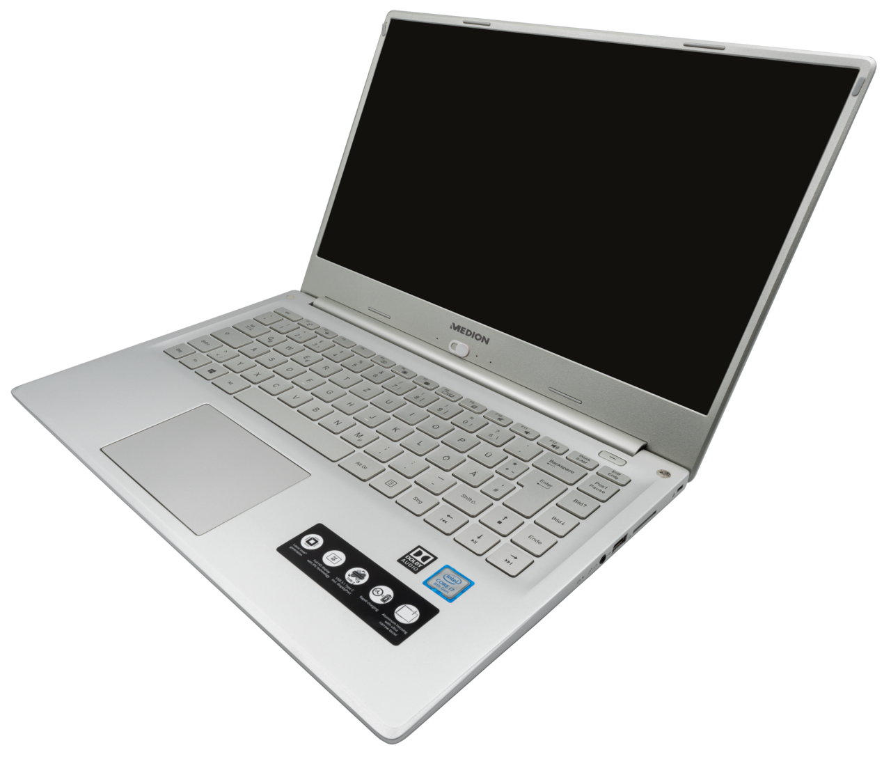 Notebook aberto com módulos de memória e armazenamento, ilustrando alta de preços de RAM e SSD